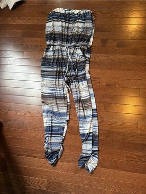 DAB Wharf Jumpsuit: Striped Blue, Black and Beige Sleeveless Jumpsuit